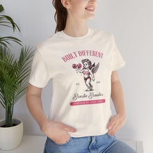 Load image into Gallery viewer, Built Different Cupid Fitness Tee — 'Built Different' Cherub Weightlifting Graphic T-Shirt